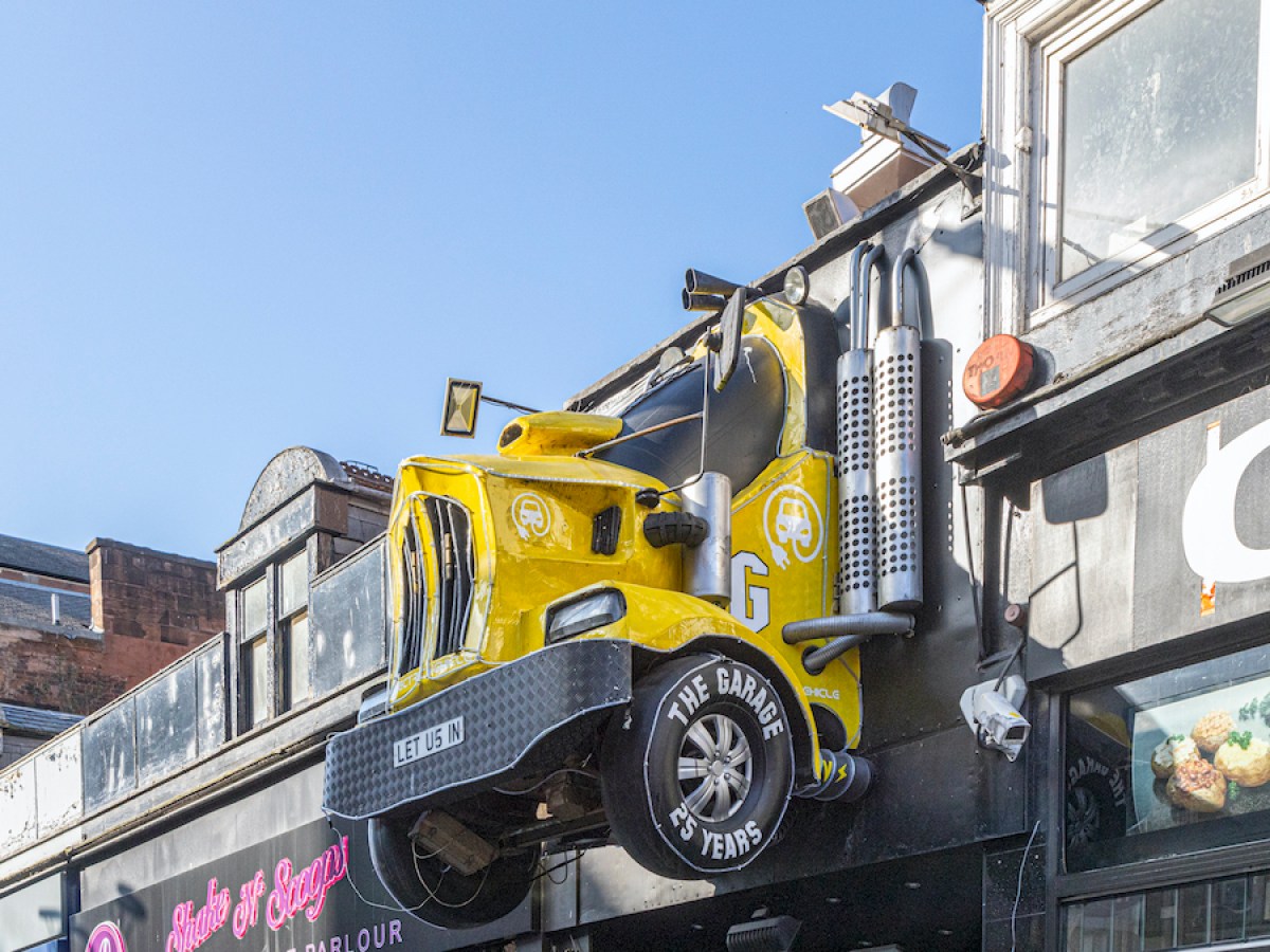 a truck is parked on the side of a building